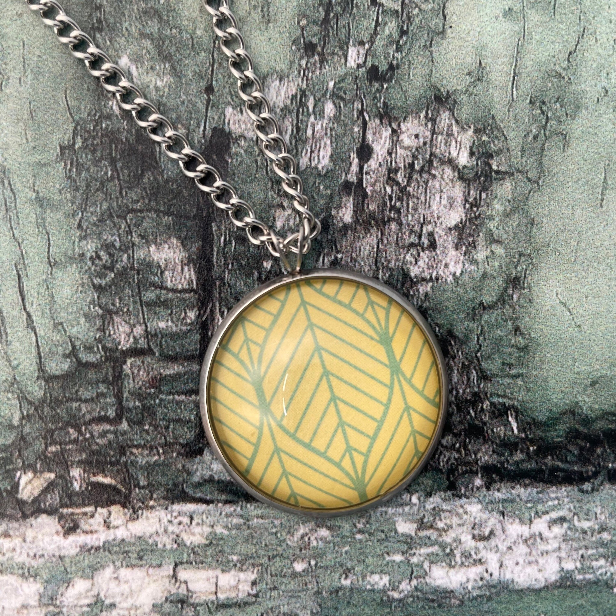 Yellow and Green Leaf Print Glass Cabochon Pendant Necklace