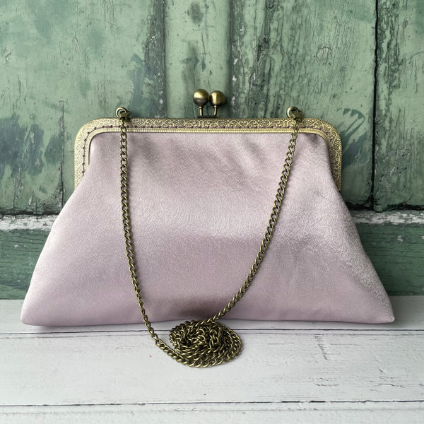 Mauve discount clutch bag